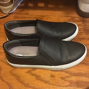 Women’s black leather sneakers